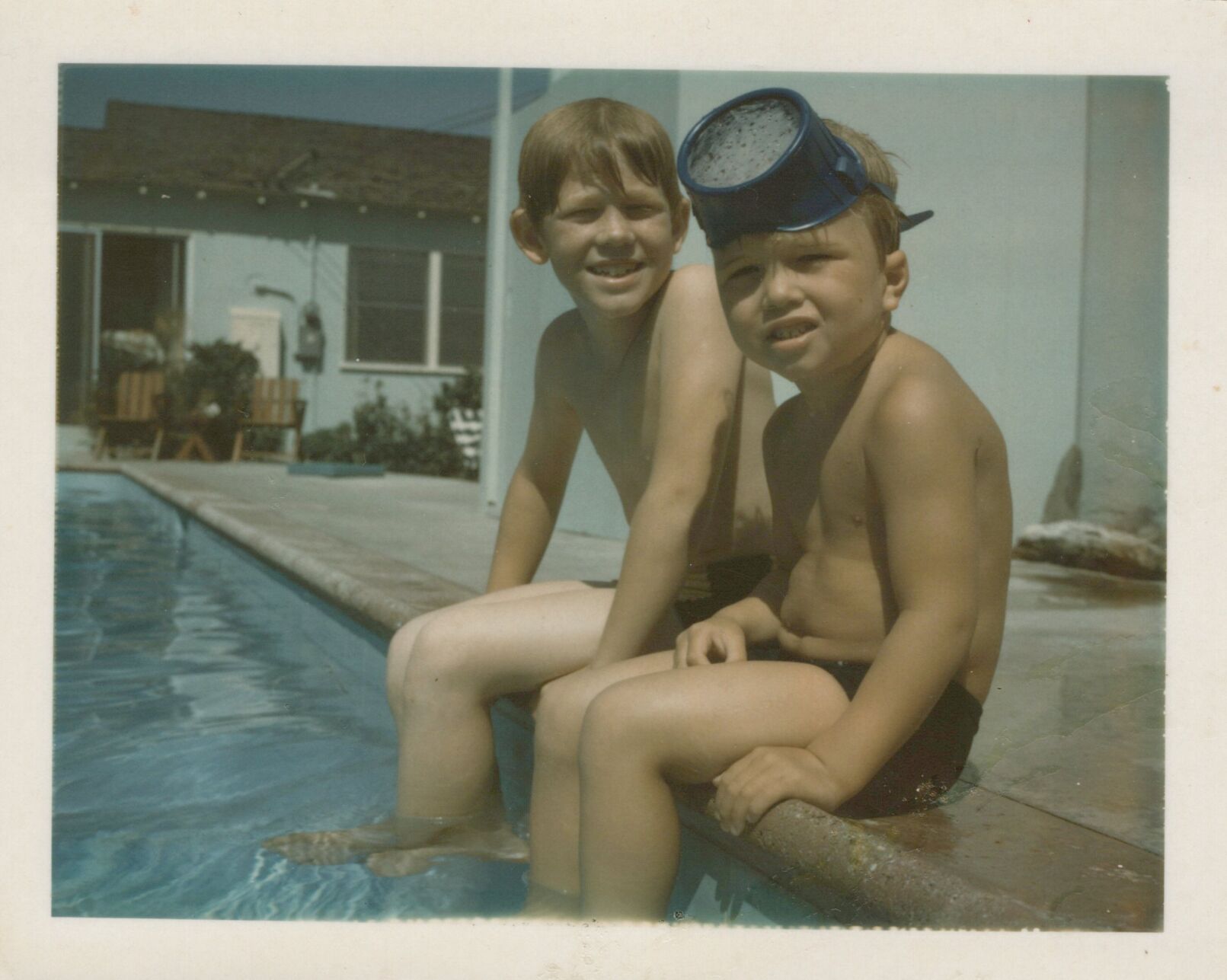 Ron and Clint Howard poolside